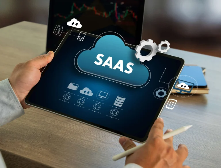 An executive analyzing a digital comparison screen weighing SaaS development services against custom software architecture.